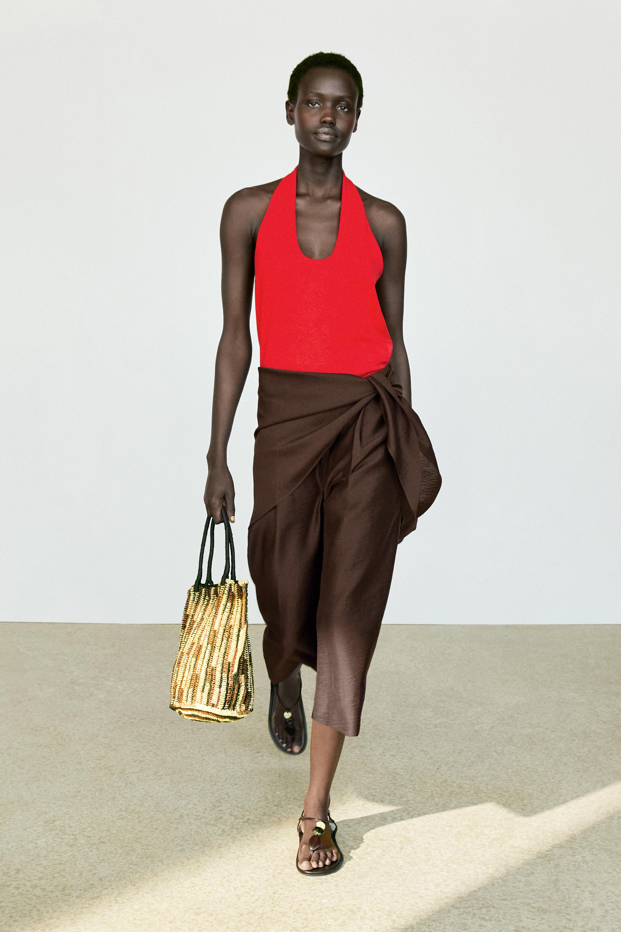 Long flowing Bermuda shorts with scarf detail